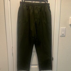 White Stag Dark Green pants with functional front pockets.